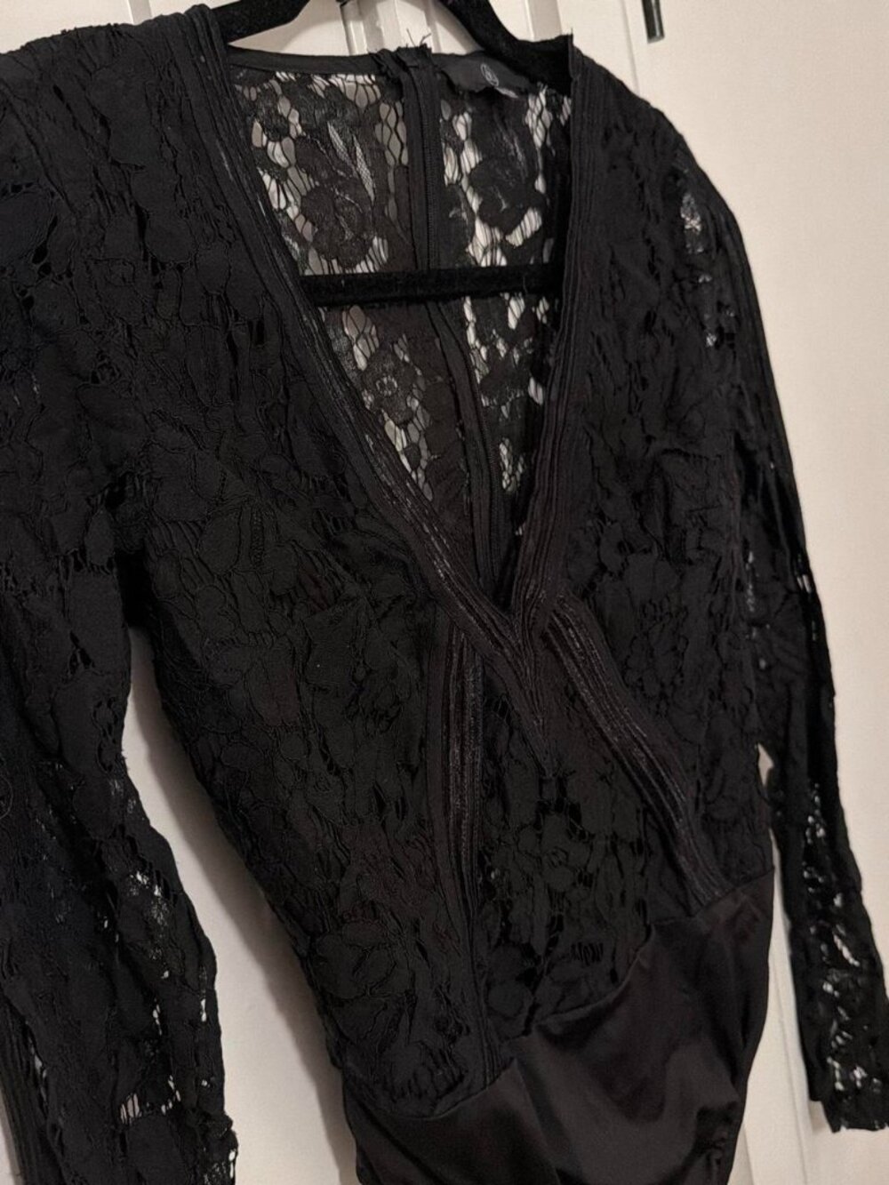 Black lace bodysuit with floral design